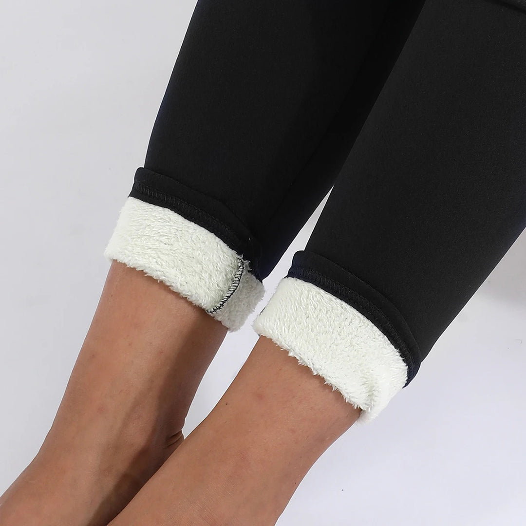 Close-up of Noelle leggings' fleece lined ankle cuffs on both legs