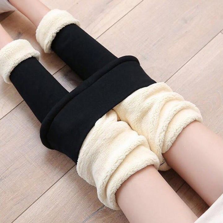 Close-up of Noelle leggings' fleece lined ankle cuffs on both legs