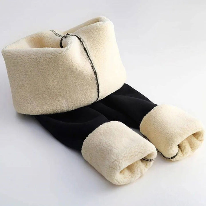 Close-up of Noelle leggings' fleece lined ankle cuffs on both legs