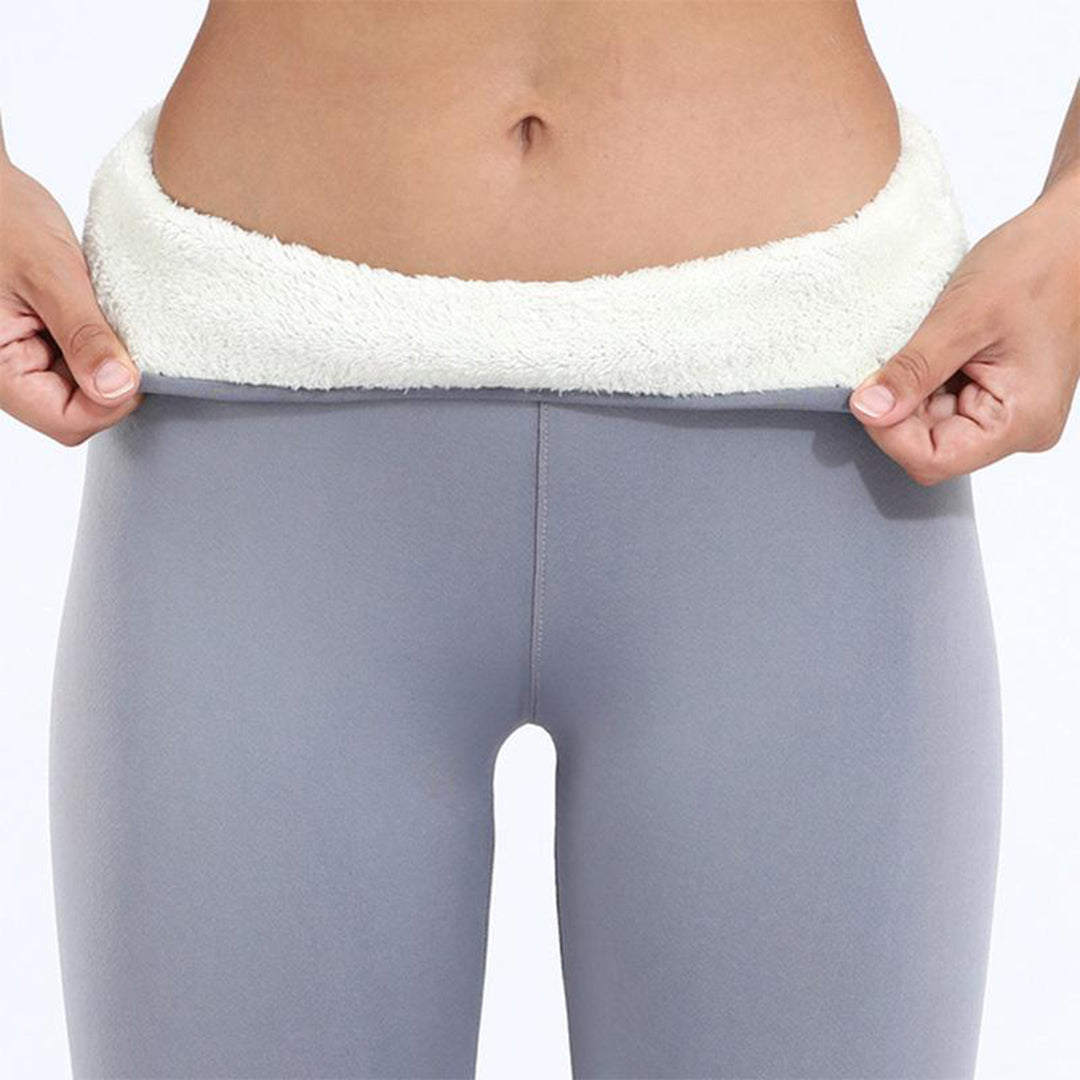 Close-up of Noelle leggings' fleece lined ankle cuffs on both legs