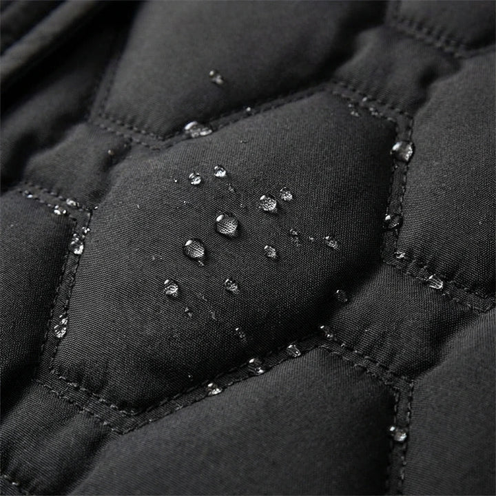 Rosalind hooded longline down coat in black, front view
