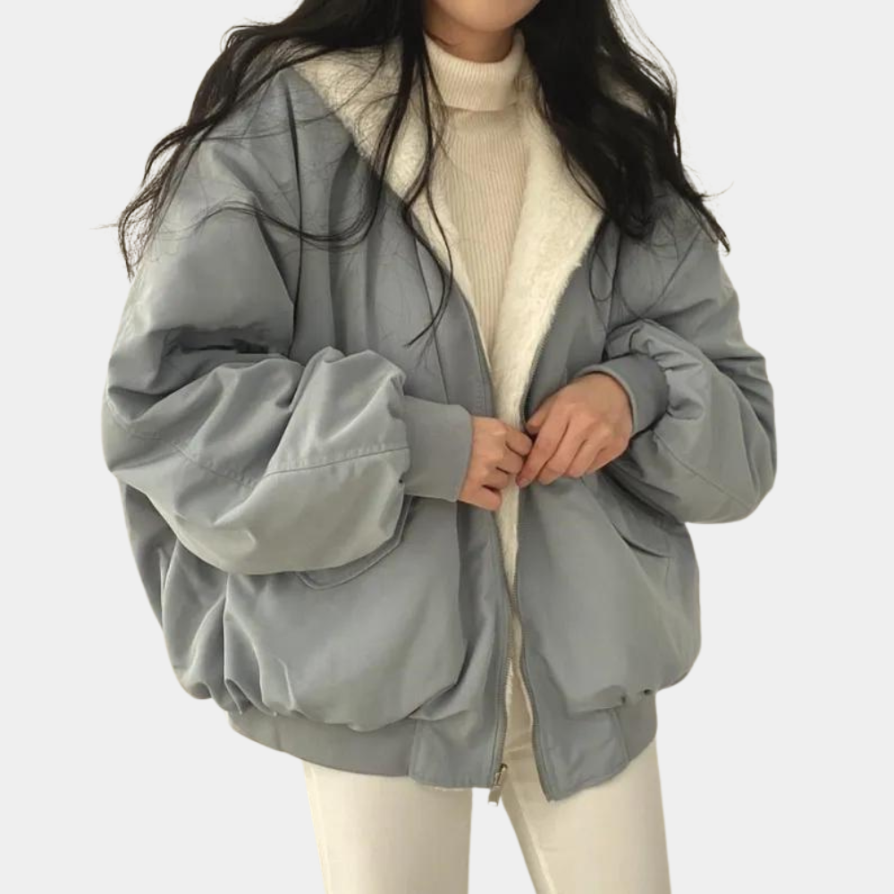 Céleste hooded oversized puffer jacket in grey, front view with hood up