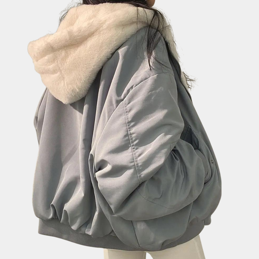 Céleste hooded oversized puffer jacket in grey, back view with hood