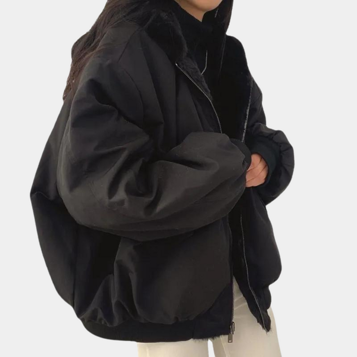 Céleste hooded oversized puffer jacket in grey, back view with hood