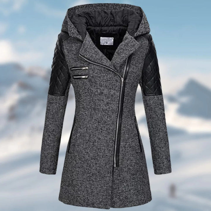 Rosamund winter coat close-up of quilted sleeve panel and zip pockets