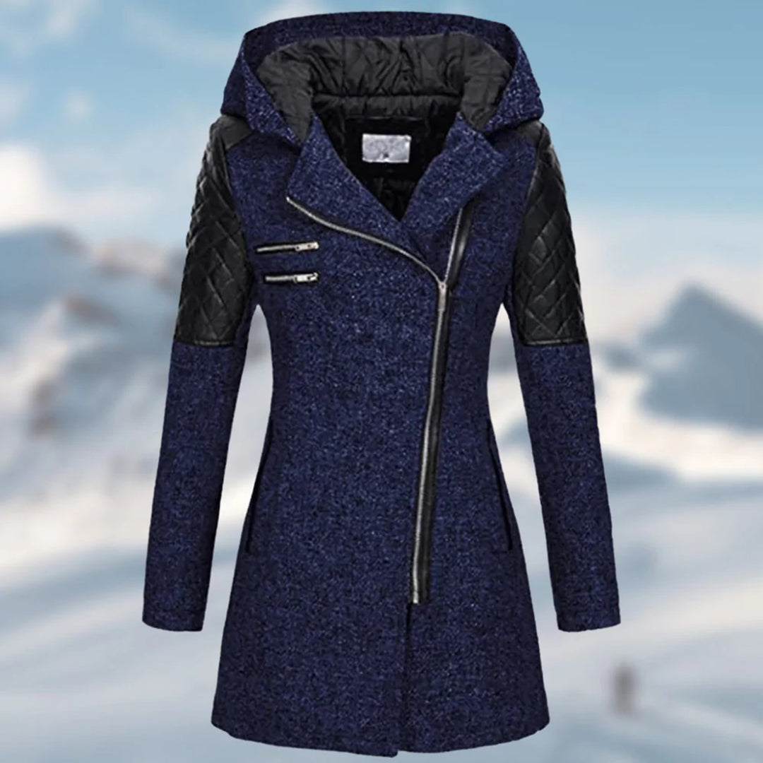 Rosamund winter coat close-up of quilted sleeve panel and zip pockets