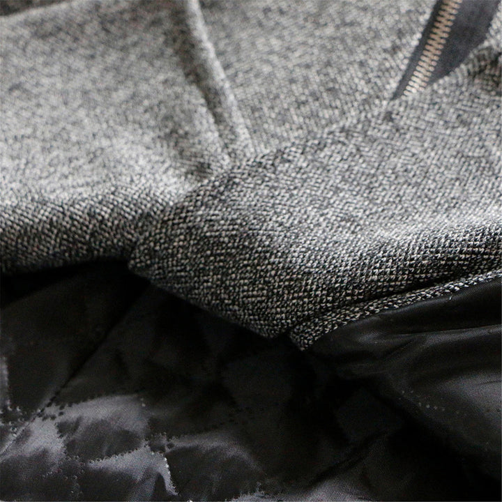 Rosamund winter coat close-up of quilted sleeve panel and zip pockets