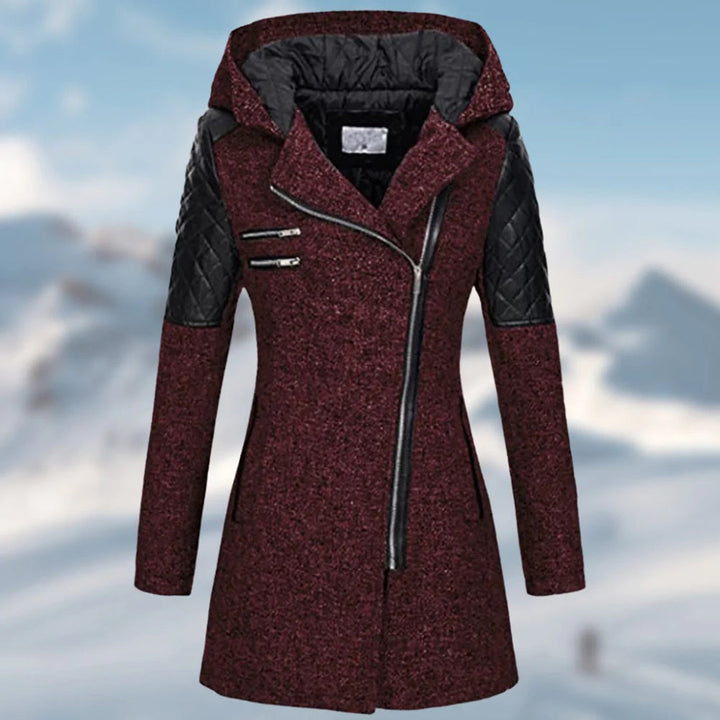 Rosamund winter coat close-up of quilted sleeve panel and zip pockets