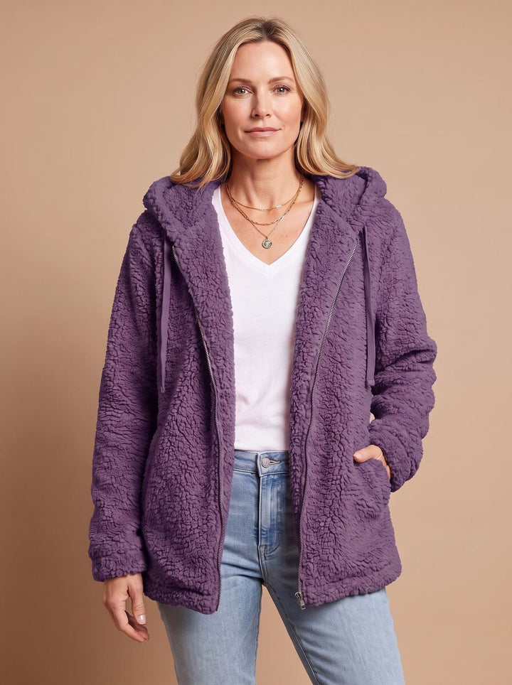 Rosalie hooded teddy fleece jacket in beige, front view with hands in pockets