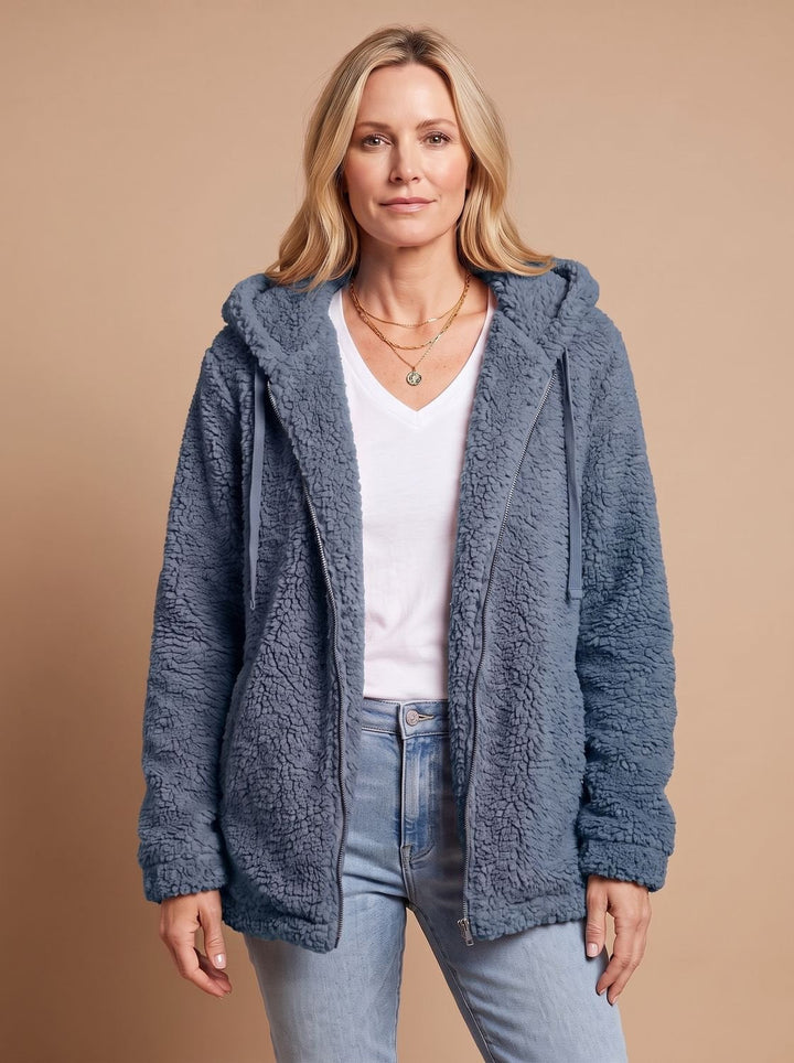 Rosalie hooded teddy fleece jacket in beige, front view with hands in pockets