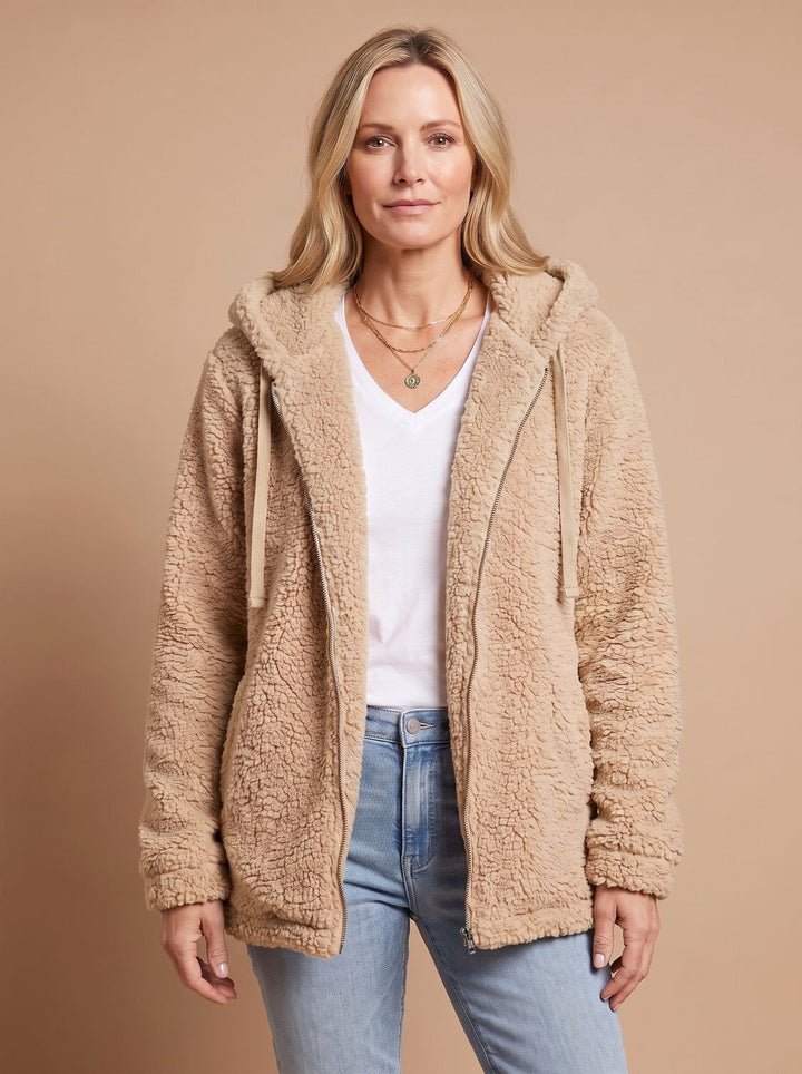 Rosalie hooded teddy fleece jacket in beige, front view with hands in pockets