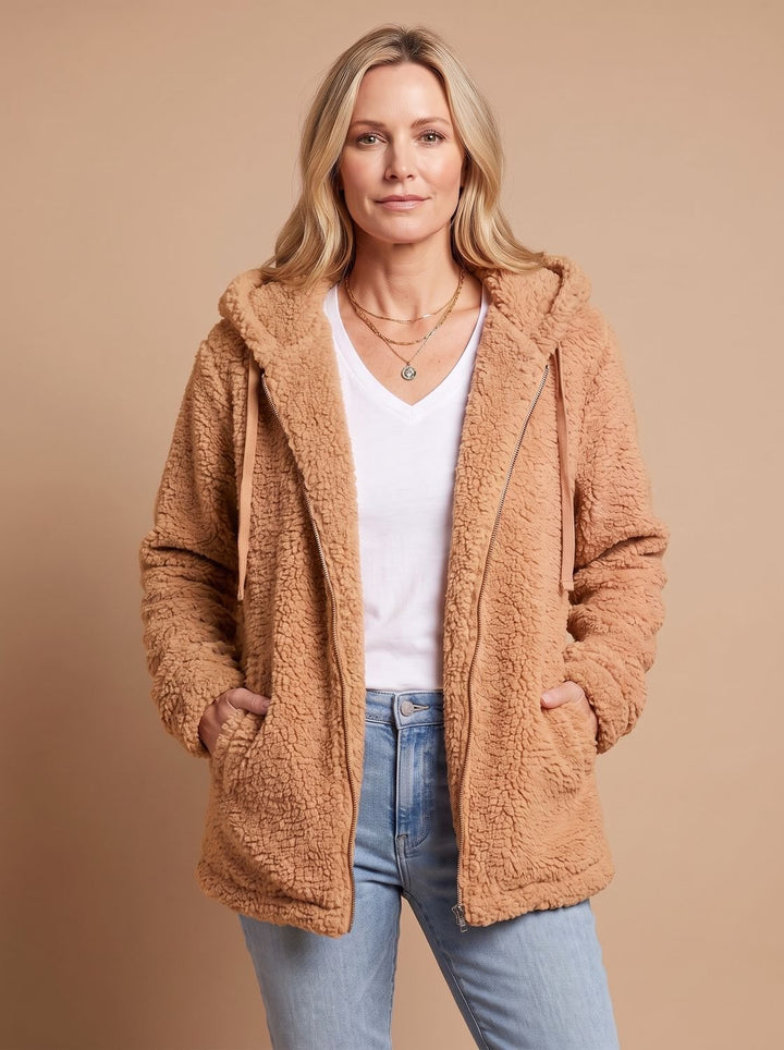 Rosalie hooded teddy fleece jacket in beige, front view with hands in pockets