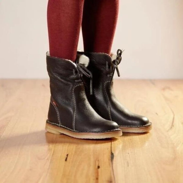 Odessa winter boots in dark brown, front view on model
