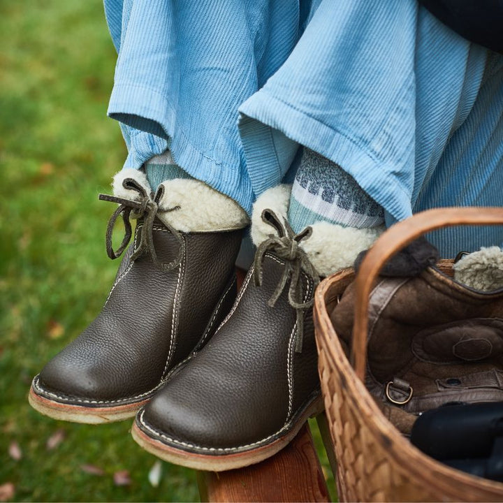 Odessa winter boots styled outdoors with knit socks