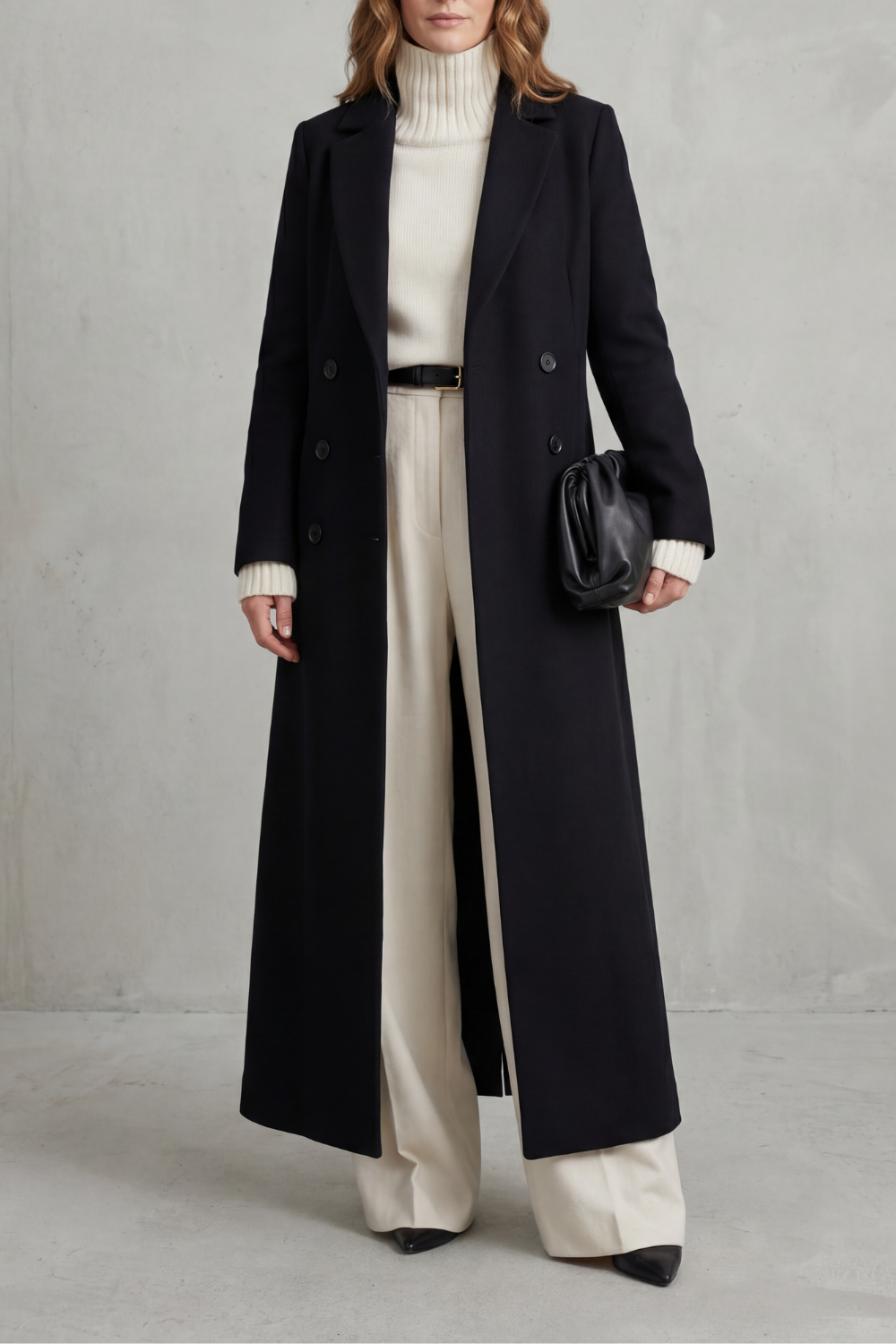 Delphine longline double-breasted coat in black, close-up styled with turtleneck