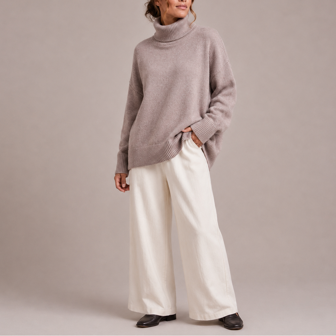 Teodora oversized turtleneck sweater in beige, side view