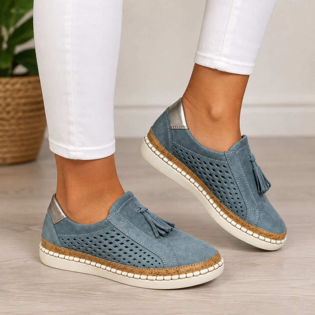 Isadora perforated tassel slip-on loafers in blue, close-up front view