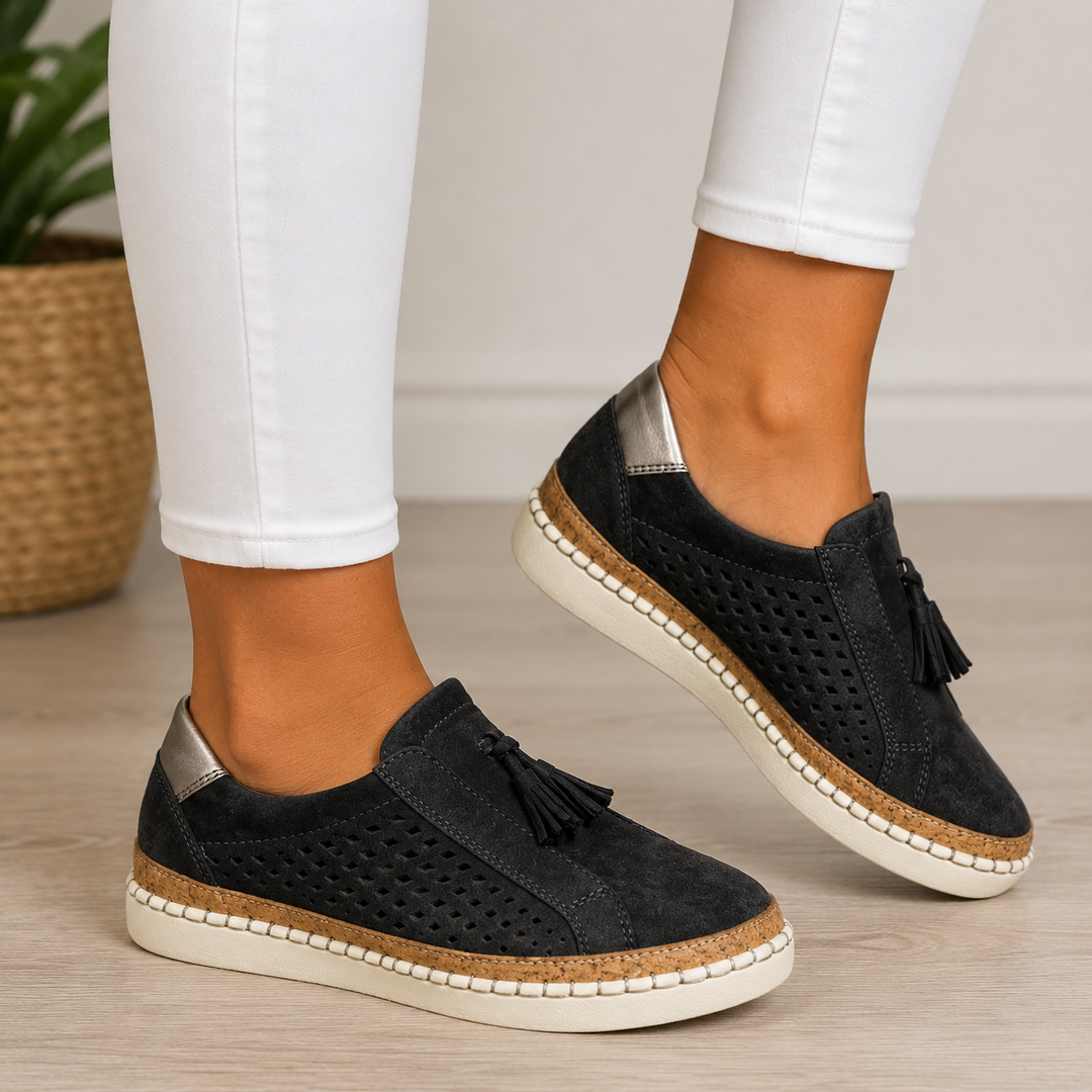 Isadora perforated tassel slip-on loafers in green, close-up side view