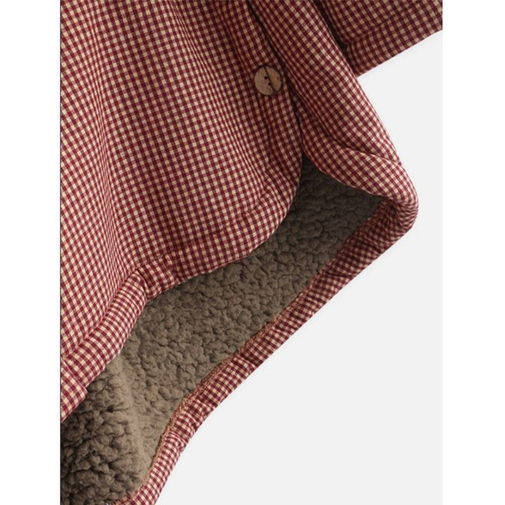 Close-up of Esmeralda coat plaid pattern fabric texture