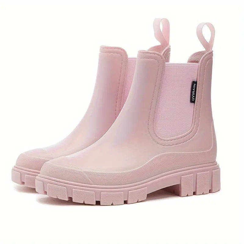 Noelani pink platform Chelsea rain boots, side view