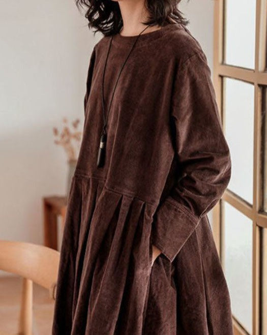 Odessa pleated midi dress in brown, close-up of neckline and sleeve