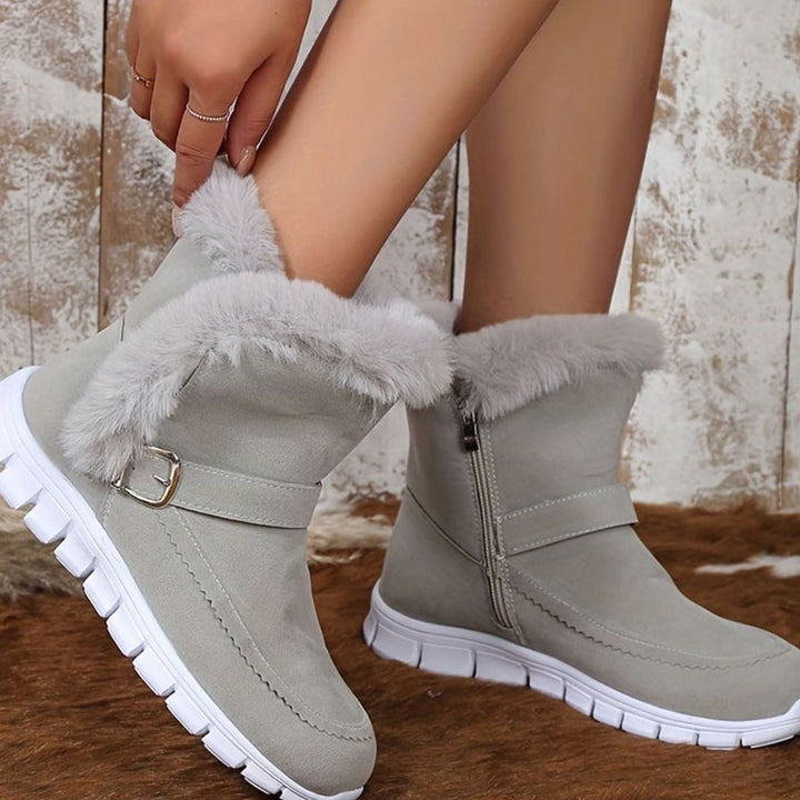 Harriet pink plush-trimmed ankle snow boots with zipper, worn on foot