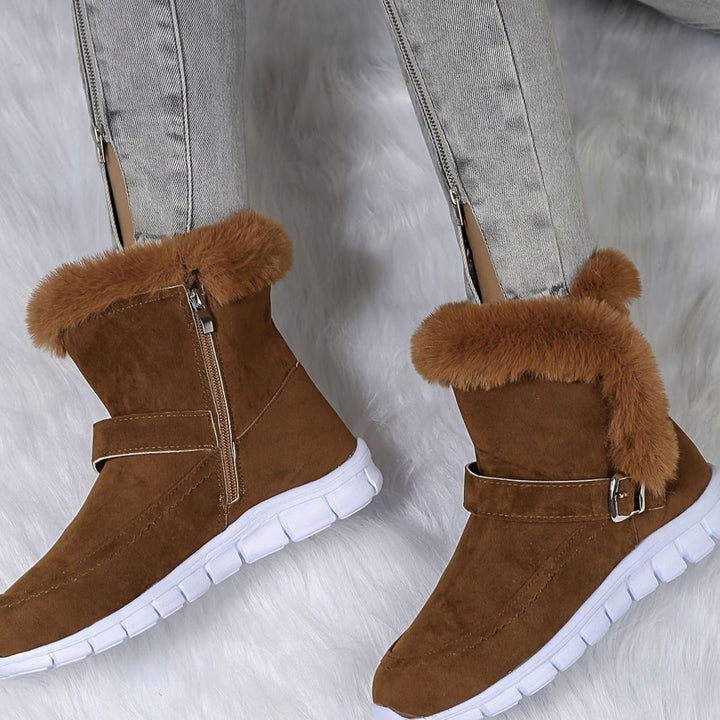 Harriet pink plush-trimmed ankle snow boots with zipper, worn on foot