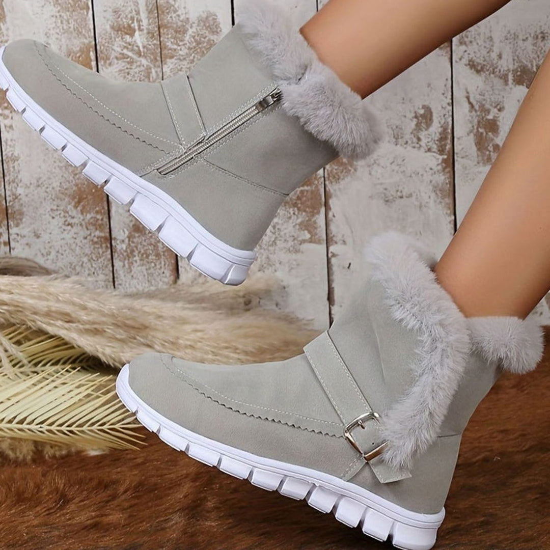 Harriet pink plush-trimmed ankle snow boots with zipper, worn on foot