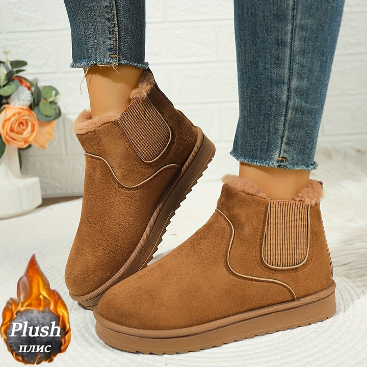 Odette light brown plush platform ankle boots, side view on model