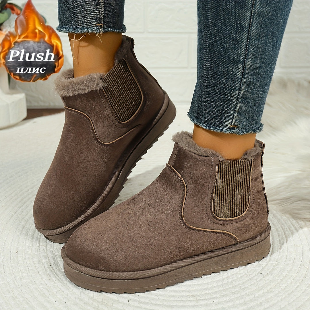 Odette dark brown plush platform ankle boots, side view on model