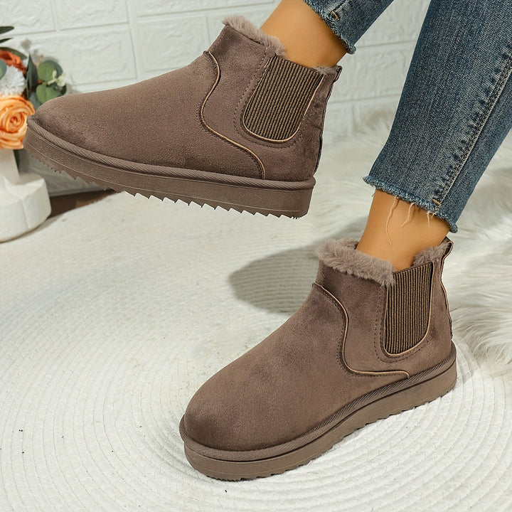 Odette brown plush platform ankle boots, close-up of fur lining and sole detail