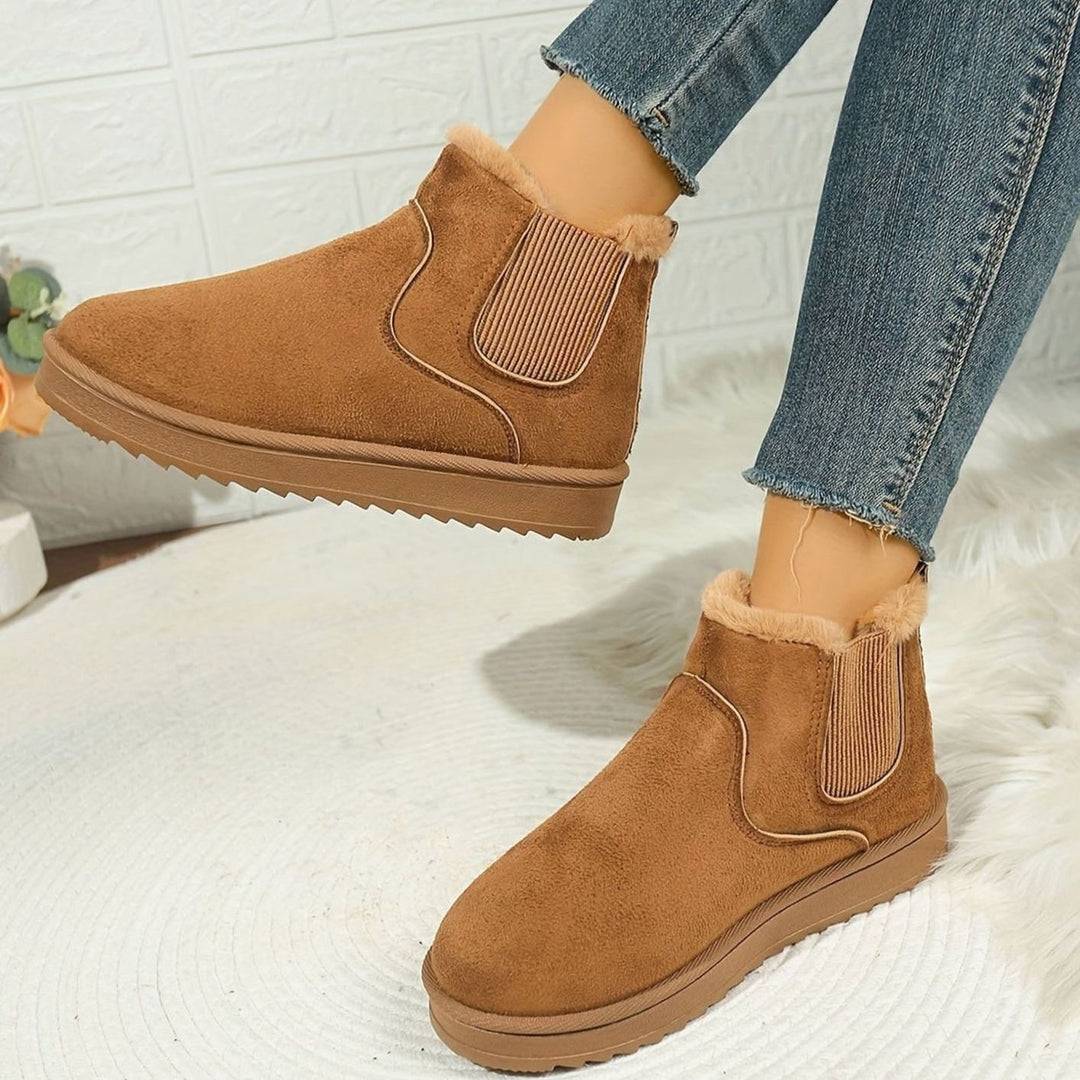 Thea plush-lined slip-on ankle boots in light brown, side profile view