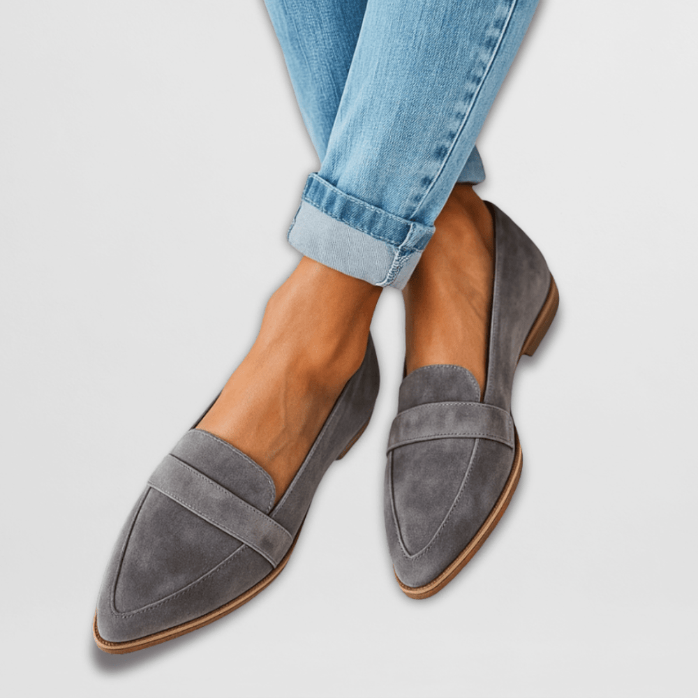Rosalind gray pointed toe slip-on loafers worn with cuffed jeans, front view