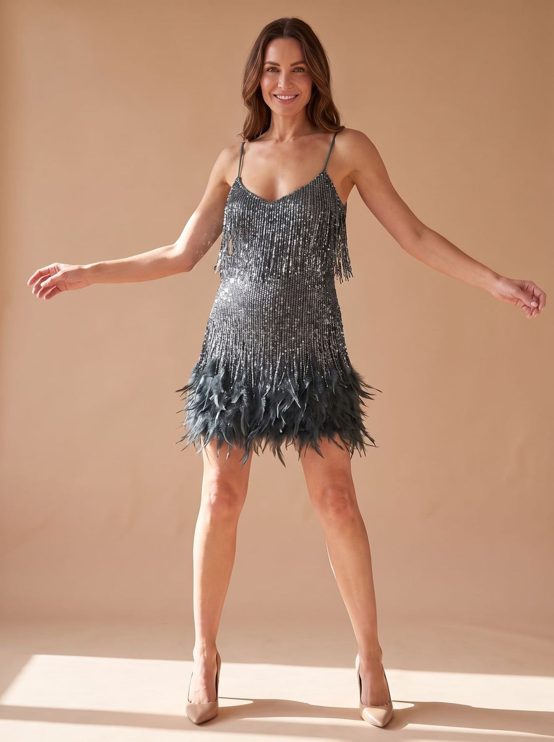 Vespera sequin mini dress with feather fringe hem, front view, silver