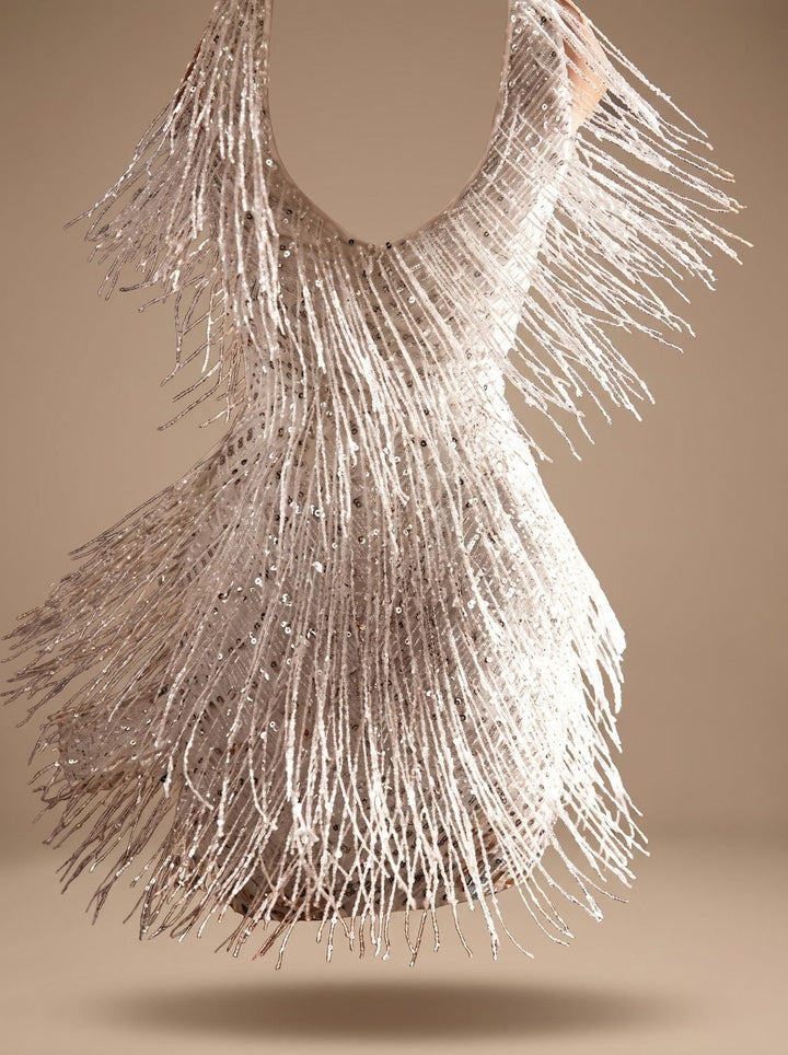 Close-up of sequin fringe detail on Odessa mini dress bodice