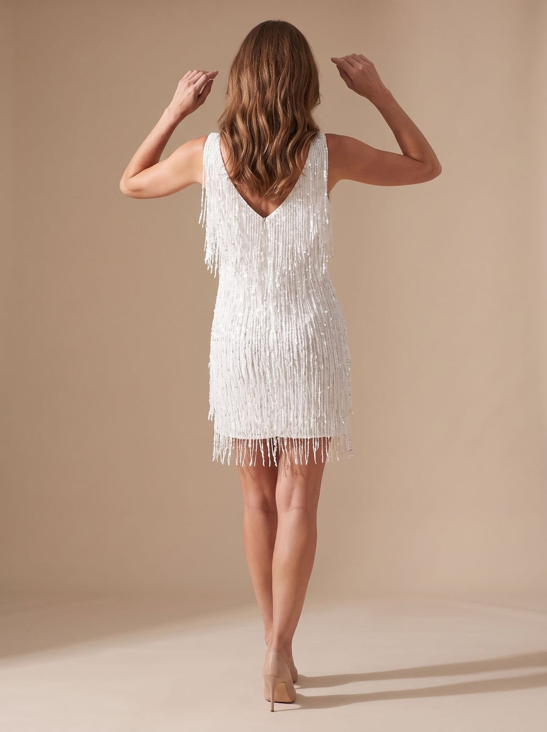 Close-up of sequin fringe detail on Odessa mini dress bodice