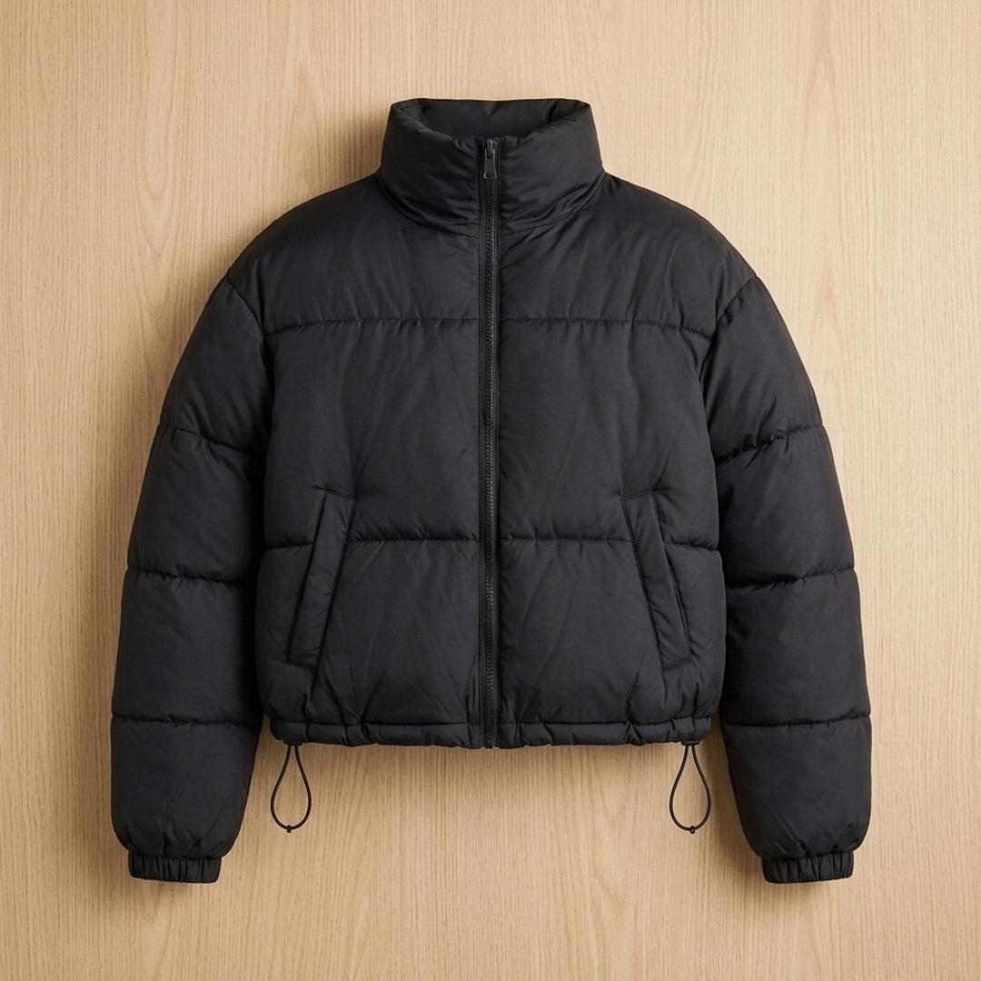 Odette quilted short puffer jacket in black, flat lay front view