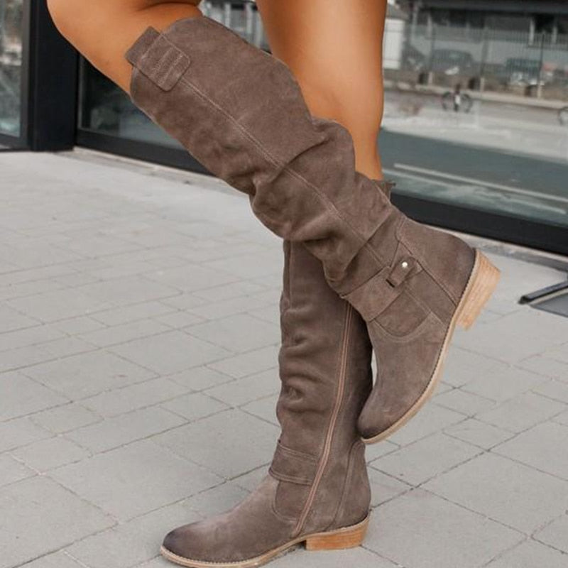Georgette slouch knee high boots in taupe, side view on model walking