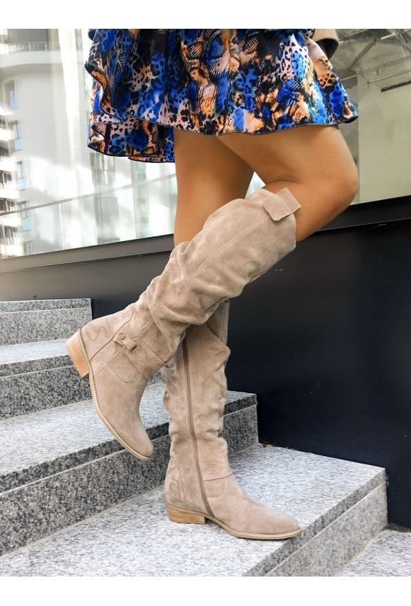 Georgette slouch knee high boots in brown, front view with floral dress