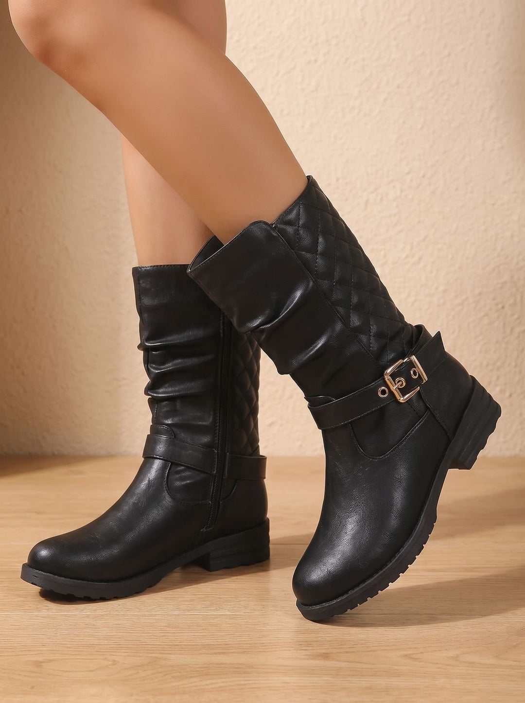 Esme slouch mid-calf boots, close-up of ruched shaft and buckle strap