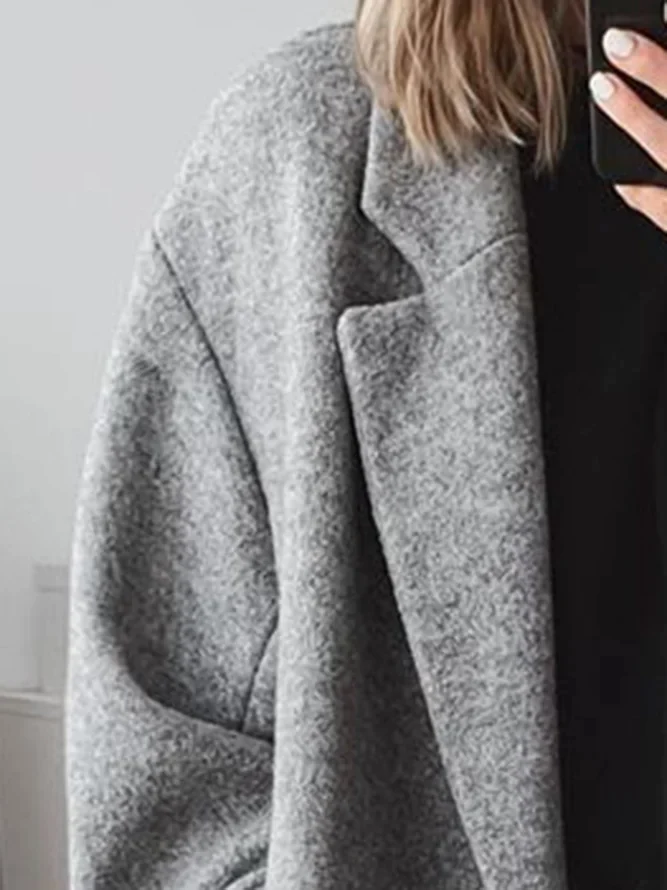 Close-up of Seraphine overcoat collar and shoulder seam