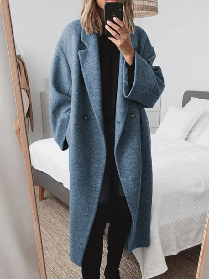Seraphine tailored long overcoat in brown, front view in mirror selfie