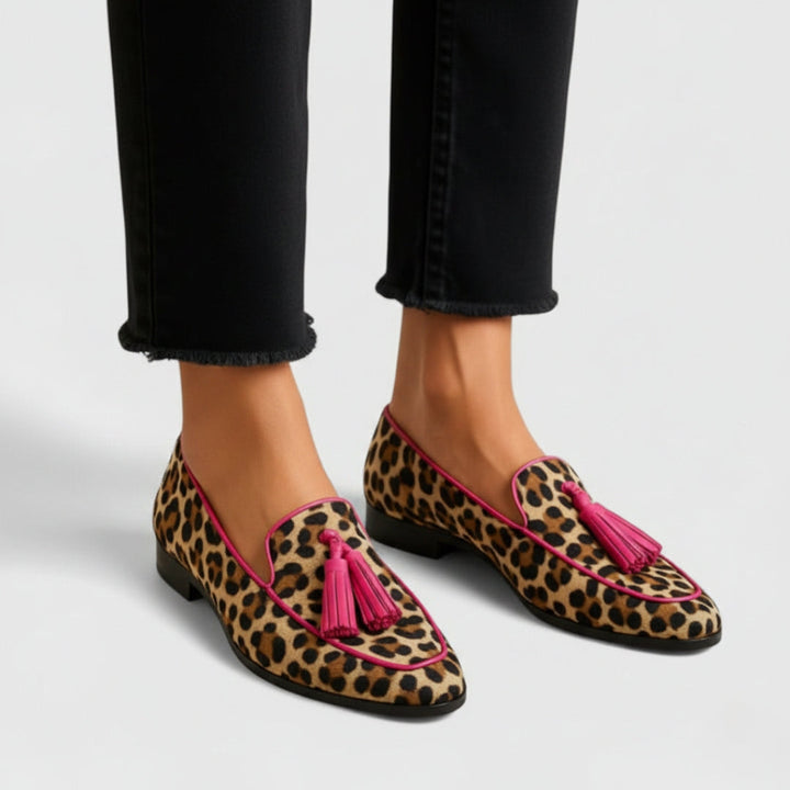 Estelle leopard print tasseled loafers on model, close-up front view