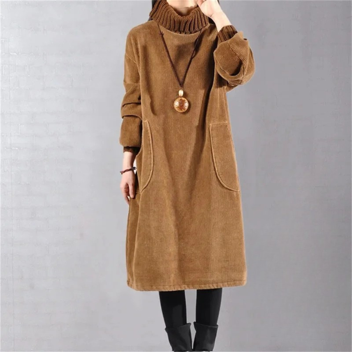 Marcelline turtleneck midi sweater dress in coffee, front view with pockets and necklace