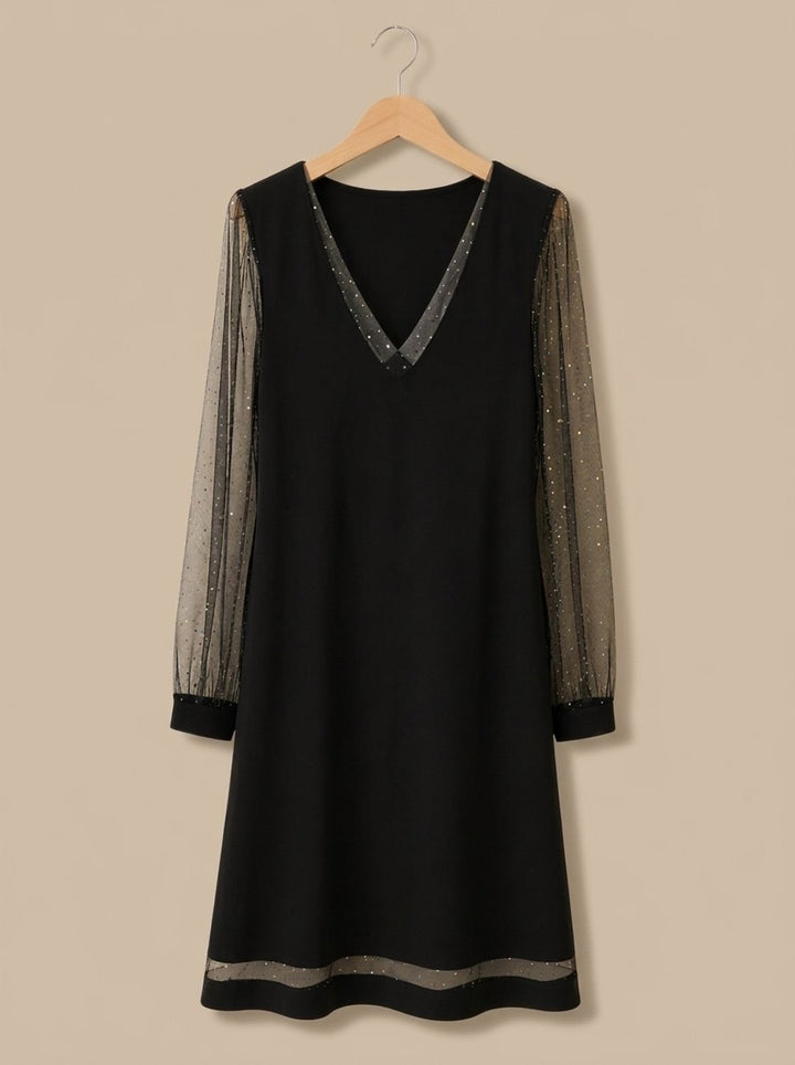 Marisol black glitter mesh sleeve mini dress, flat lay on hanger