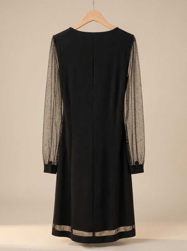 Marisol black glitter mesh sleeve mini dress, flat lay on hanger