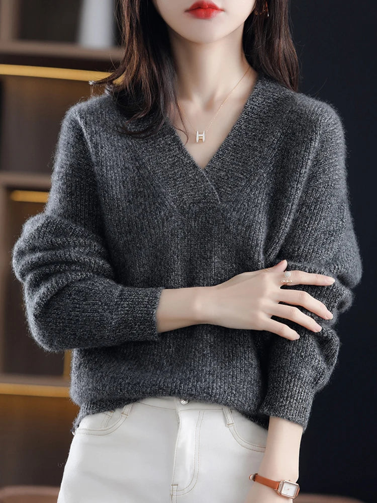 Briony V-neck knit sweater in dark gray, arms crossed detail view