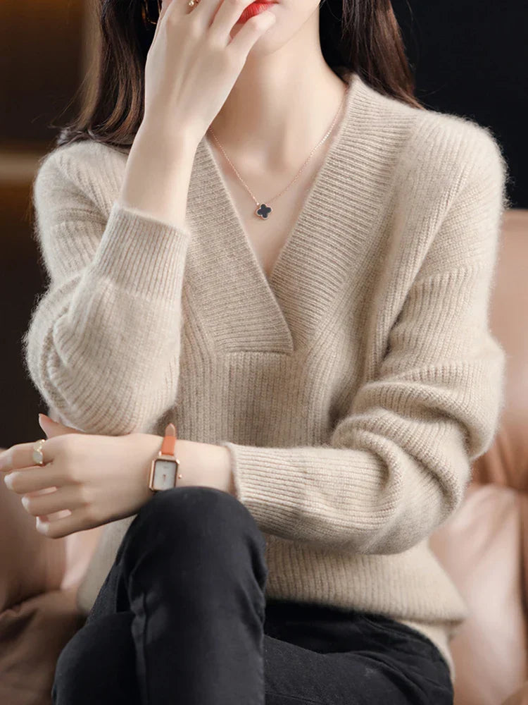 Briony V-neck knit sweater in beige, seated front view