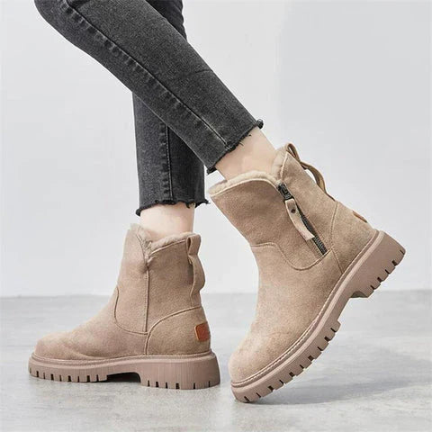 Winnifred beige ankle boots worn with cropped jeans, side view