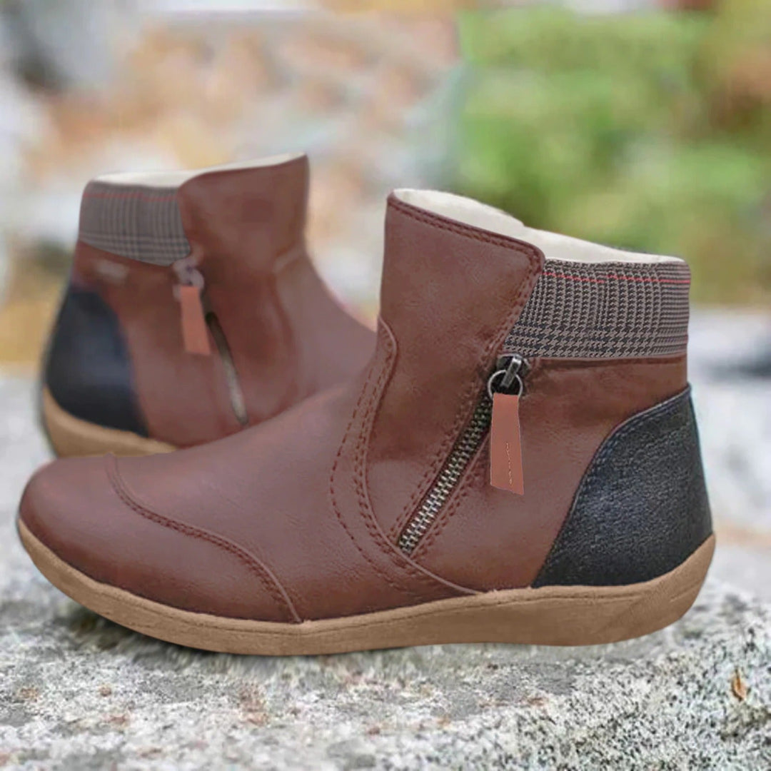 Linnea brown zip-up ankle boots with woven cuff detail, side view